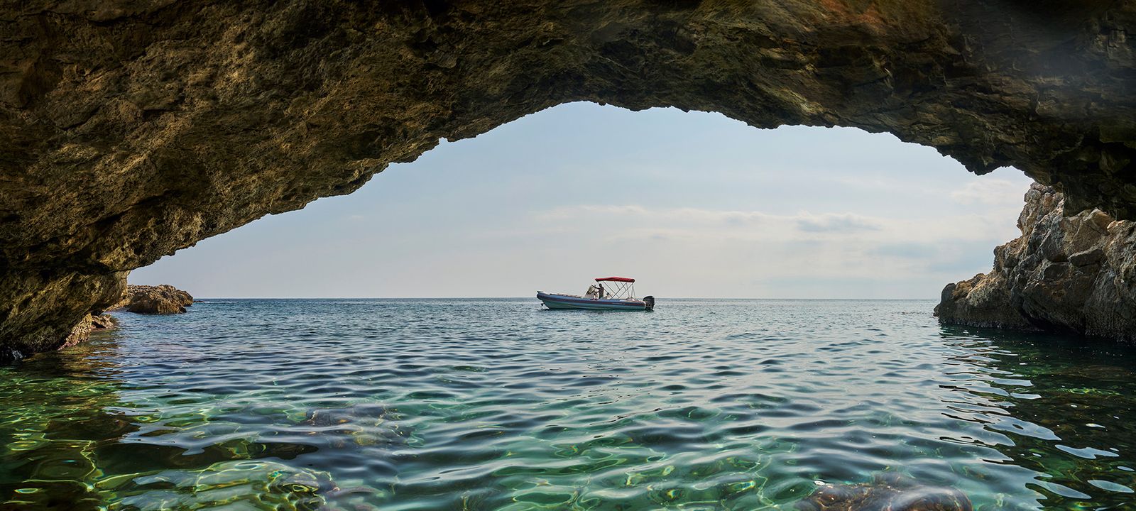 Sea cave and rock arch along the coast of Syracuse